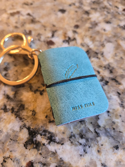 GREEN FEATHER MICRO JOURNAL KEYCHAIN