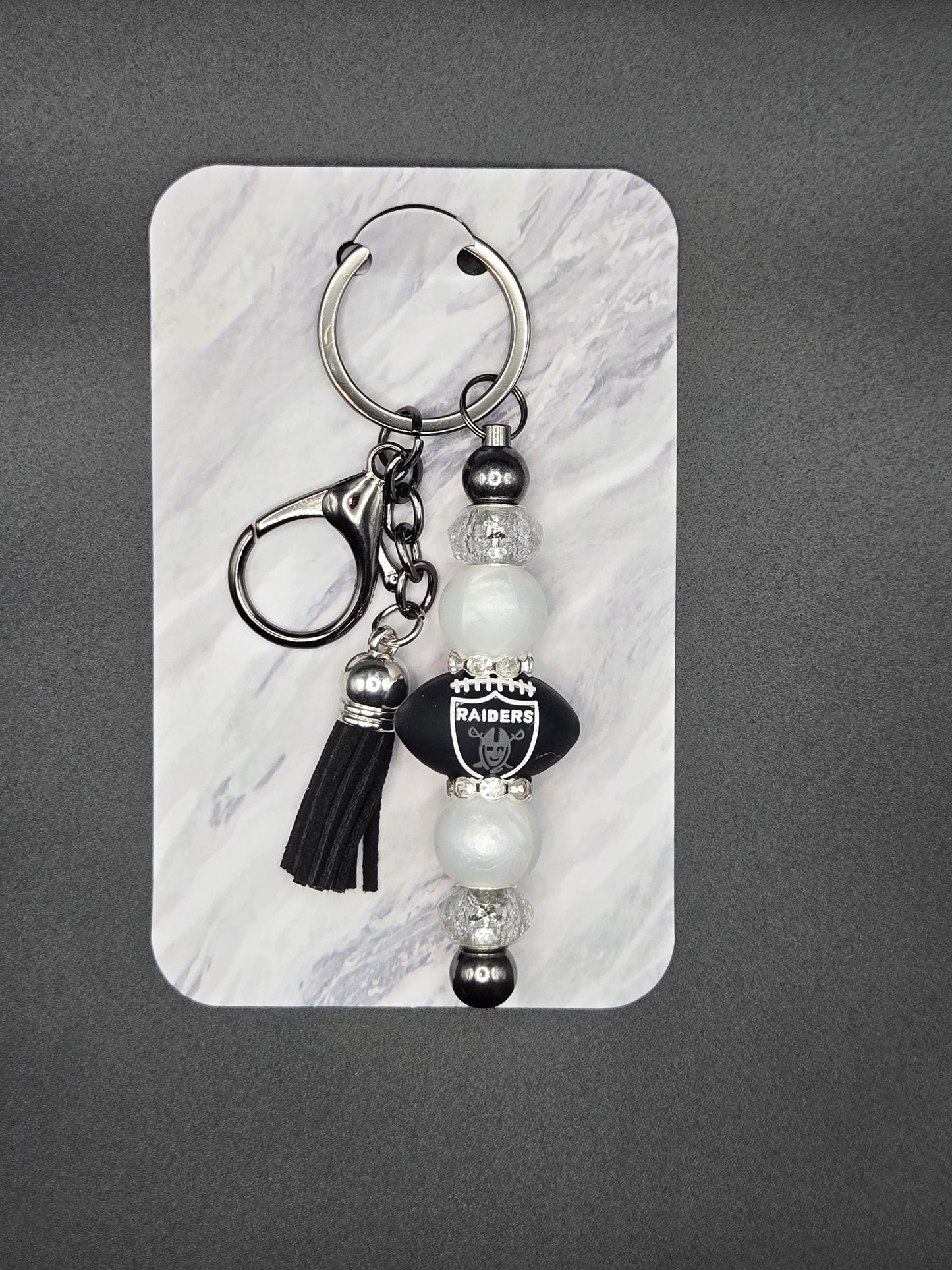 Black raiders keychain